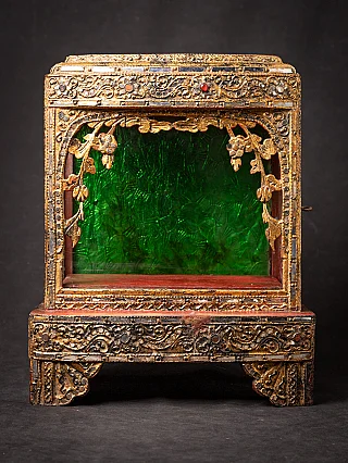 Antique wooden Burmese Buddha temple