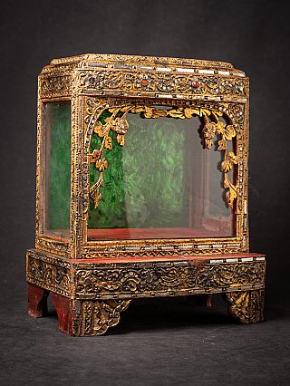 Antique wooden Burmese Buddha temple