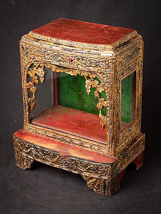 Antique wooden Burmese Buddha temple