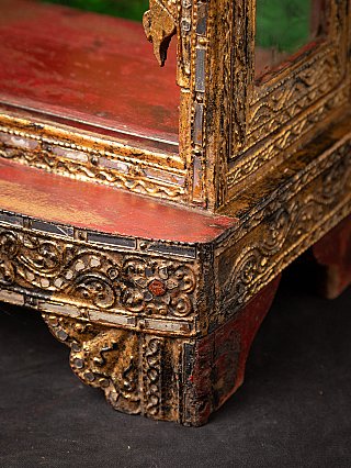 Antique wooden Burmese Buddha temple