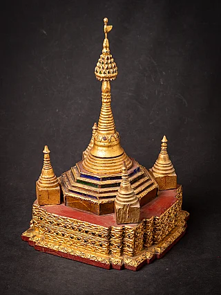 Antique wooden Burmese Stupa