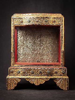 Antique wooden Burmese Buddha temple