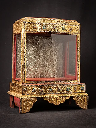 Antique wooden Burmese Buddha temple