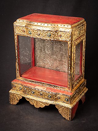 Antique wooden Burmese Buddha temple