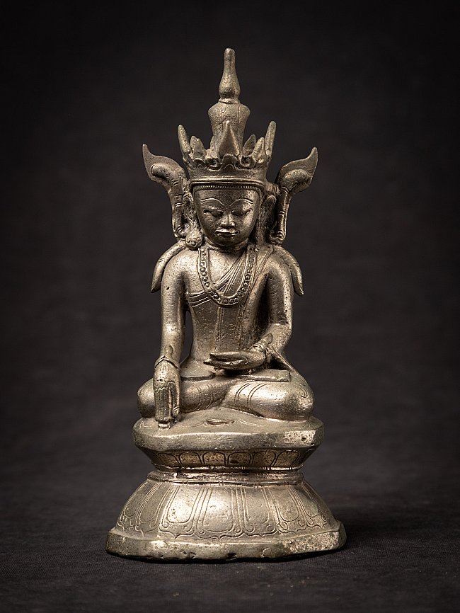 Buddha statue from Burma (Myanmar) seated with tall crown, full front view on engraved base