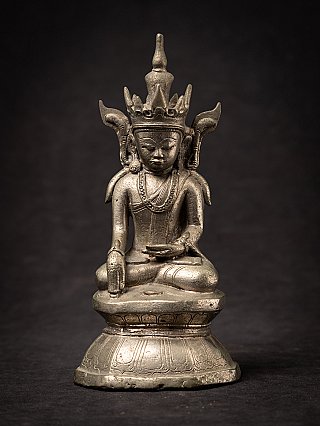 Buddha statue from Burma (Myanmar) seated with tall crown, full front view on engraved base
