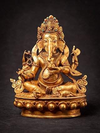 Bronze Ganesha statue from Nepal, seated on a lotus base, full front view