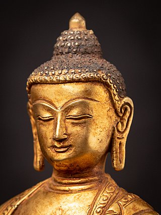 Old bronze Nepali Buddha statue