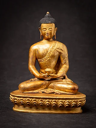 Old bronze Nepali Buddha statue