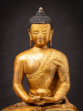 Old bronze Nepali Buddha statue