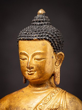 Old bronze Nepali Buddha statue