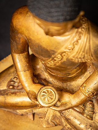 Old bronze Nepali Buddha statue
