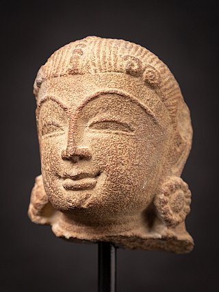 Antique Indian sandstone head of an Apsara