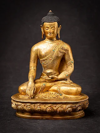 Old bronze Nepali Buddha statue