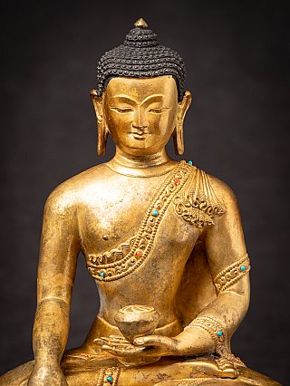 Old bronze Nepali Buddha statue
