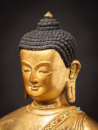 Old bronze Nepali Buddha statue