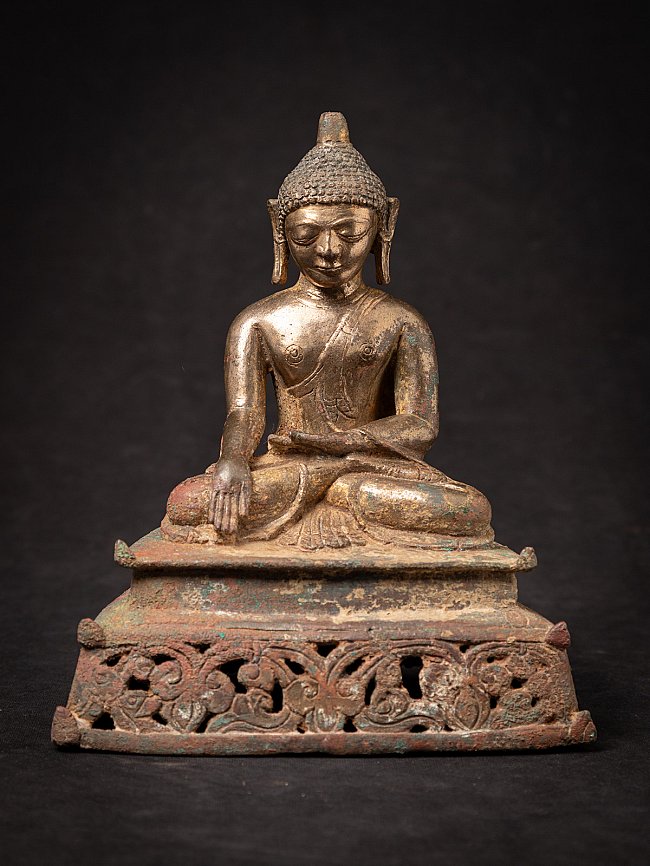 Burmese bronze Buddha statue seated in bhumisparsha mudra, full front view on openwork base