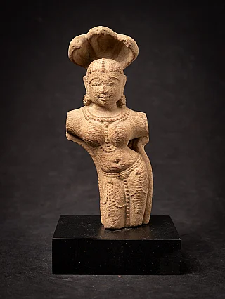 Old sandstone Indian Nagini statue