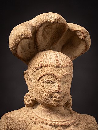 Old sandstone Indian Nagini statue