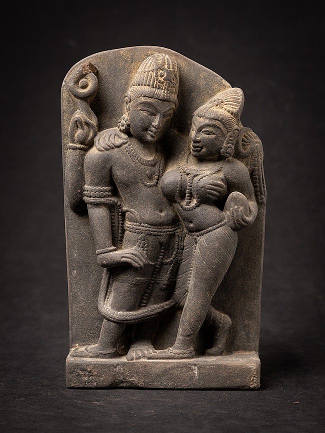 Indian Lakshmi-Narayana relief with standing couple on arched back slab, front view