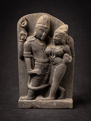 Indian Lakshmi-Narayana relief with standing couple on arched back slab, front view