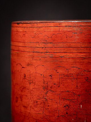 Close-up of the betelnut box side showing horizontal bands and incised lines
