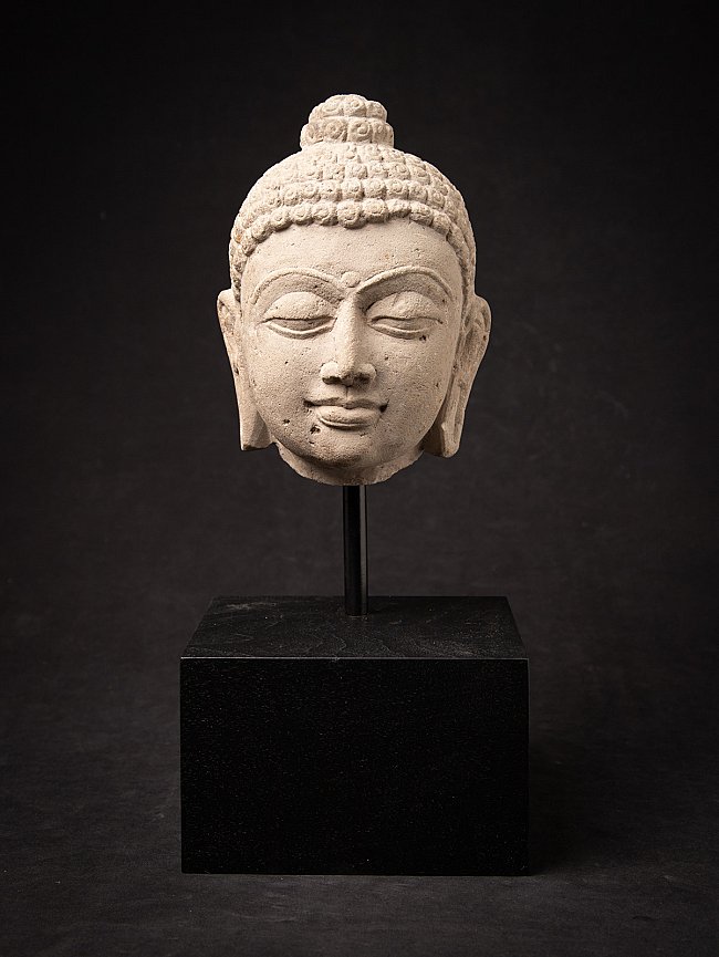 Antique Indian sandstone head of Buddha Shakyamuni