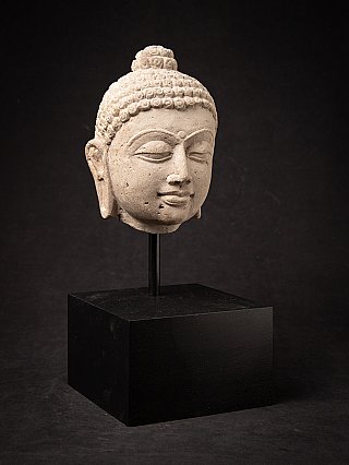 Antique Indian sandstone head of Buddha Shakyamuni