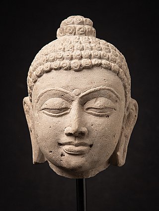 Antique Indian sandstone head of Buddha Shakyamuni