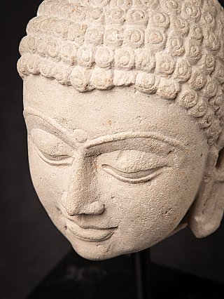 Antique Indian sandstone head of Buddha Shakyamuni