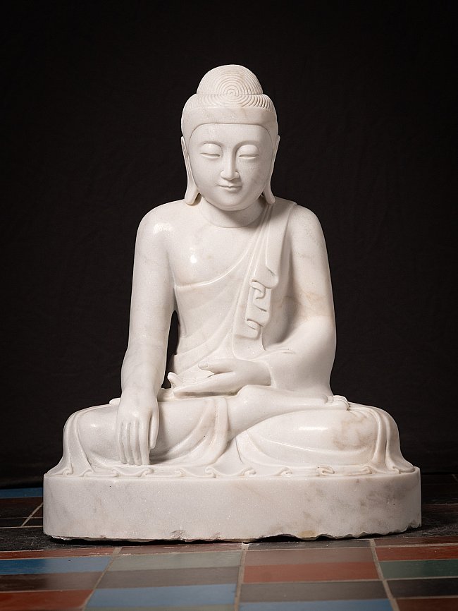 Burmese marble Buddha statue seated in bhumisparsha mudra, full front view