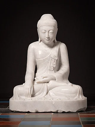 Newly made Burmese marble Buddha statue