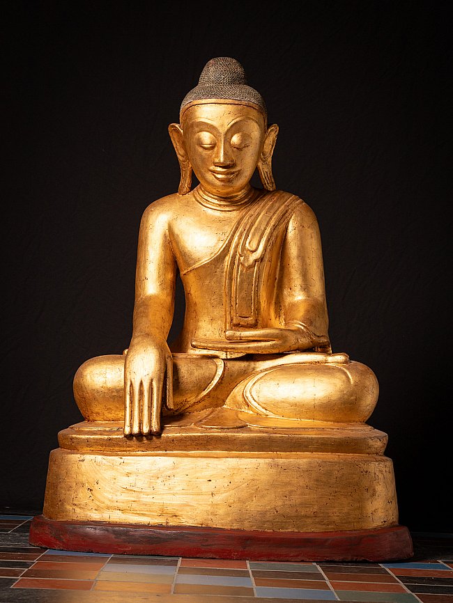Burmese Buddha statue in lacquerware, seated on a wide base, full front view