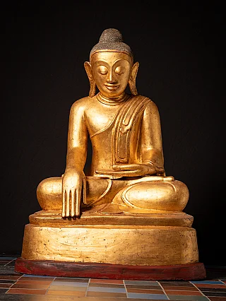 Burmese Buddha statue in lacquerware, seated on a wide base, full front view