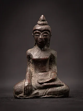 Cambodian bronze Buddha statue seated in bhumisparsha mudra, full front view