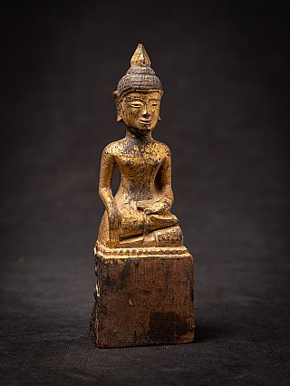Antique wooden Thai Buddha statue