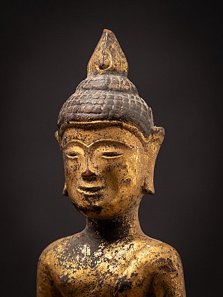 Antique wooden Thai Buddha statue