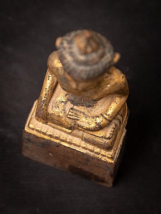Antique wooden Thai Buddha statue
