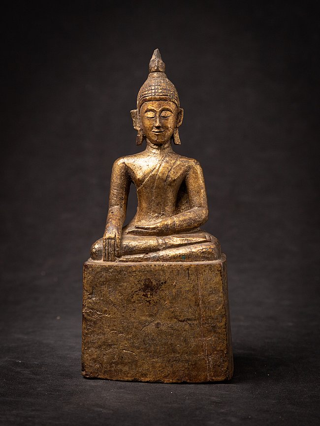 Antique Thai wooden Buddha statue seated in bhumisparsha mudra, full front view