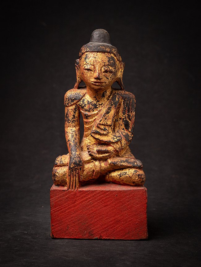 Antique wooden Burmese Buddha statue