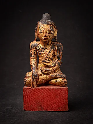 Antique wooden Burmese Buddha statue