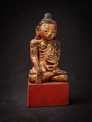Antique wooden Burmese Buddha statue
