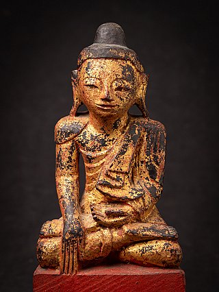 Antique wooden Burmese Buddha statue