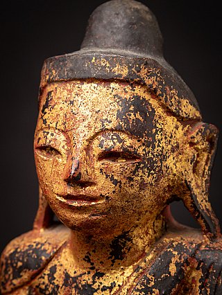 Antique wooden Burmese Buddha statue