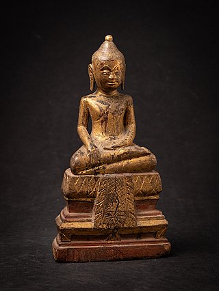 Antique wooden Thai Buddha statue