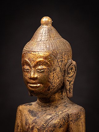 Antique wooden Thai Buddha statue