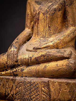 Antique wooden Thai Buddha statue