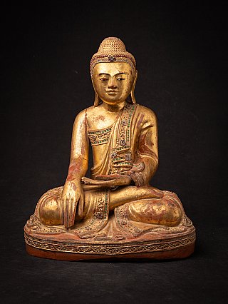 Burmese Mandalay Buddha statue in wood, seated in bhumisparsha mudra, full front view