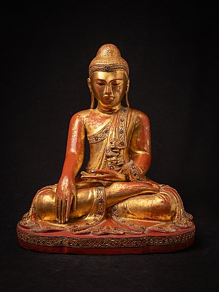 Burmese Mandalay Buddha statue in wood, seated in bhumisparsha mudra, full front view