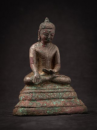 Bagan bronze Buddha statue from Burma (Myanmar), seated in bhumisparsha mudra, angled view